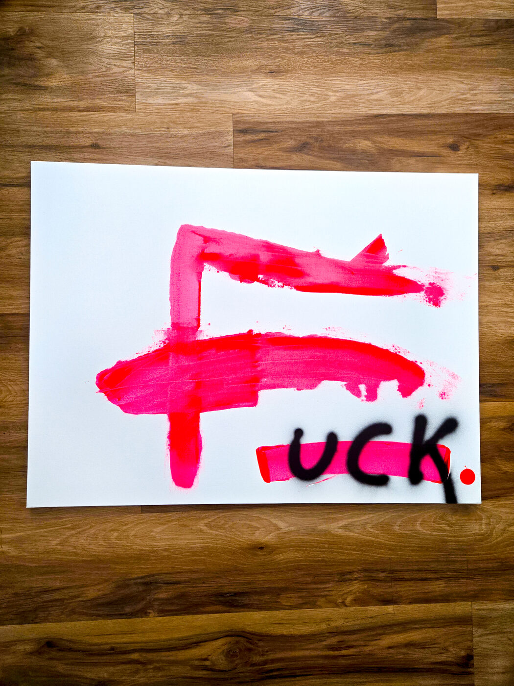 Painting in bold pink brushwork and black spray text